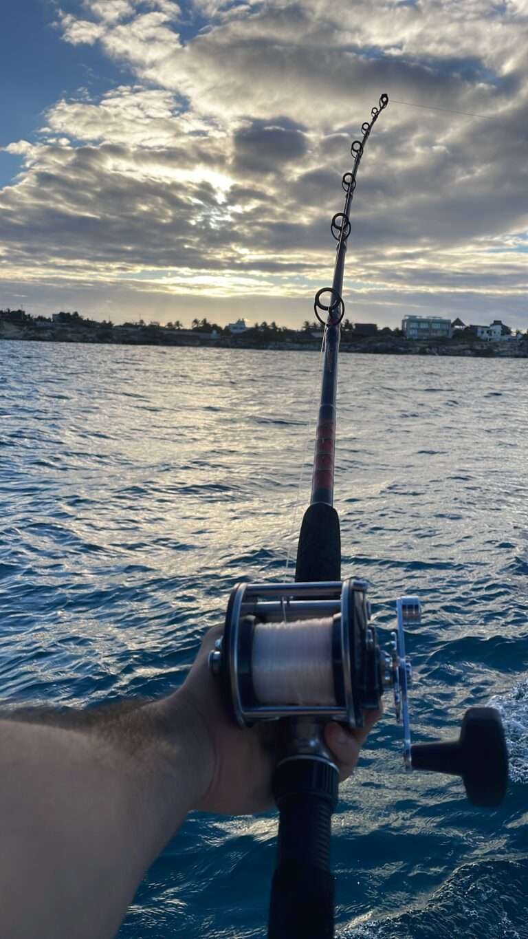 Fishing rod trolling behind the boat off Isla Mujeres